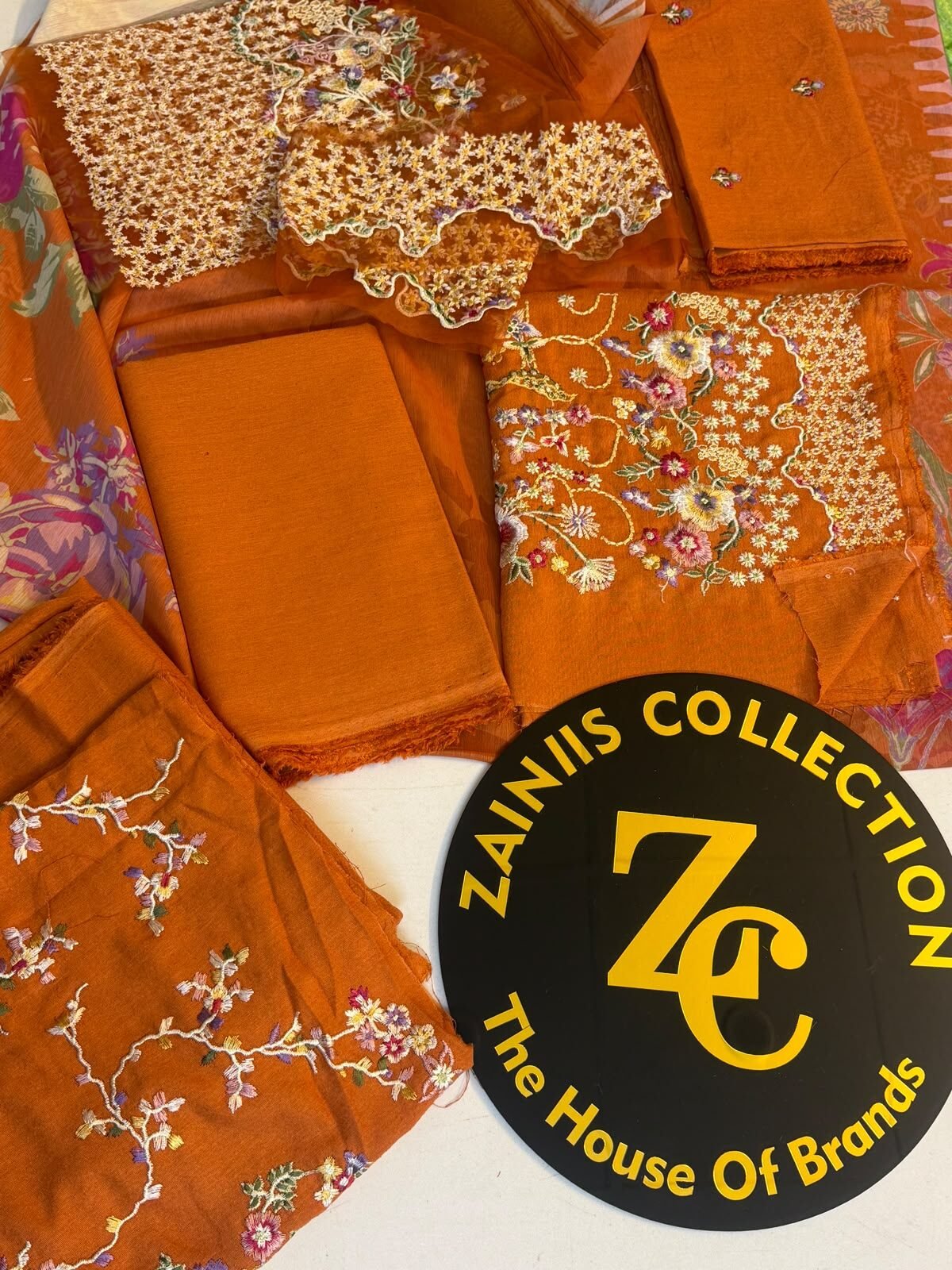 WhApp Image 2026-10-13 at 4.06.40 PM Nureh Rust Orange Embroidered Karandi Suit with Printed Sufon Dupatta – 3 Piece - Image 1