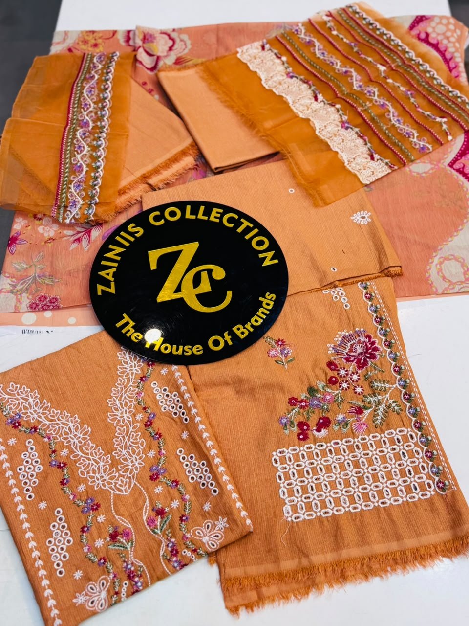 WhatsApp Image 2026-10-02 at 1.27.43 PM (2) Nureh Rust Orange Floral Embroidered Karandi Suit - Image 1