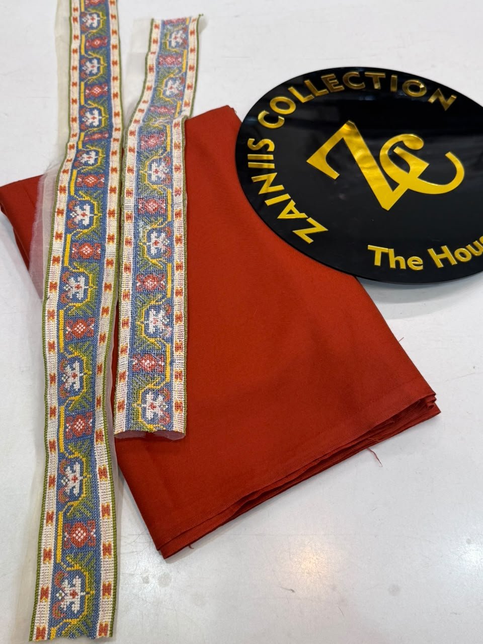 WhatsApp Image 2026-10-02 at 6.02.53 PM Rang Rasiya Rust Solid with Multicolor Karhai Lace - Image 1