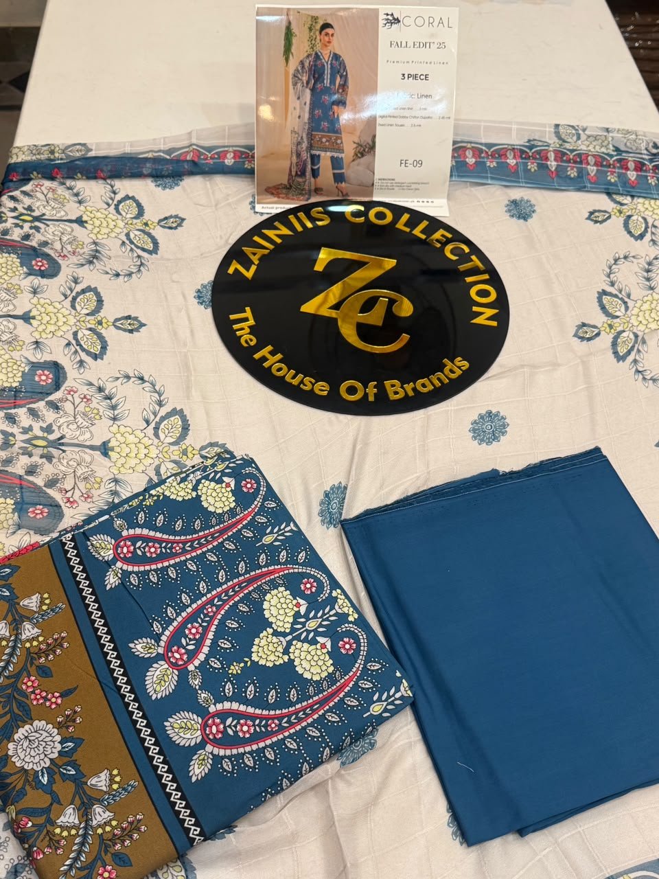 WhatsApp Image 2026-10-04 at 5.30.30 PM Rang Rasiya Coral FE-09 Teal Blue and Mustard Floral Digital Printed Linen 3 Piece Suit - Image 1