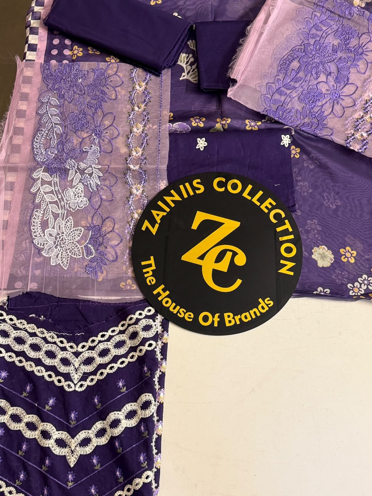 WhatsApp Image 2026-10-06 at 4.24.19 PM (1) Nureh Purple Embroidered Lawn 3-Piece Suit with Printed Chiffon Dupatta - Image 1