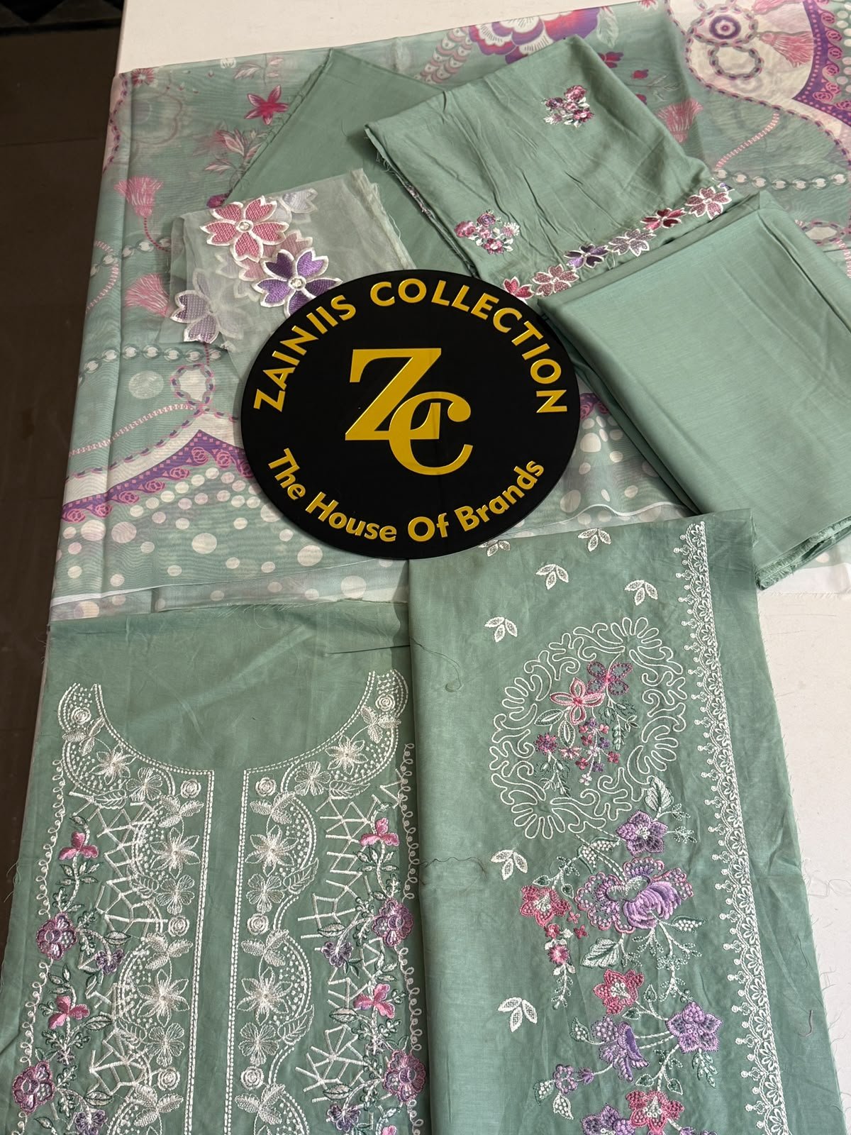WhatsApp Image 2026-10-06 at 4.24.22 PM (1) Nureh Sage Green Embroidered Lawn 3-Piece Suit with Printed Chiffon Dupatta - Image 1