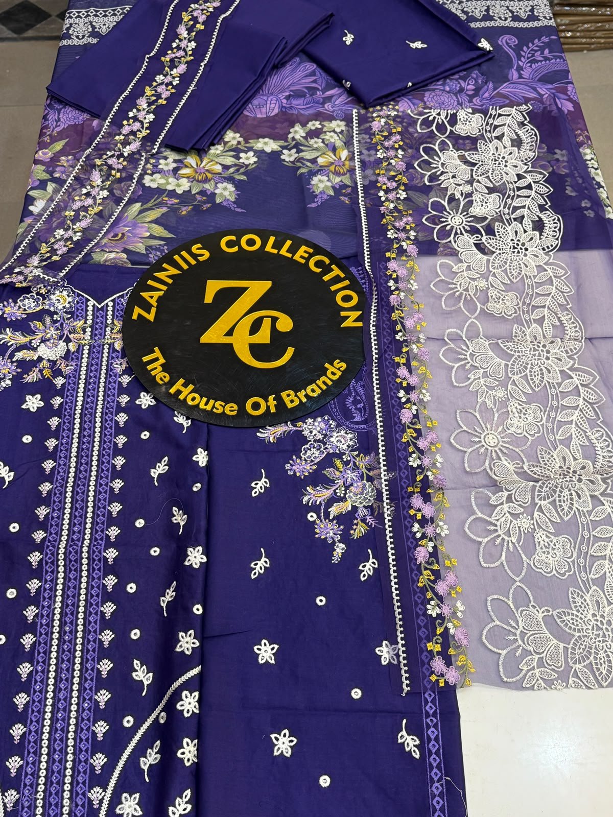 WhatsApp Image 2026-10-06 at 4.24.24 PM (3) Nureh Royal Purple Embroidered Lawn 3-Piece Suit with Printed Chiffon Dupatta - Image 1