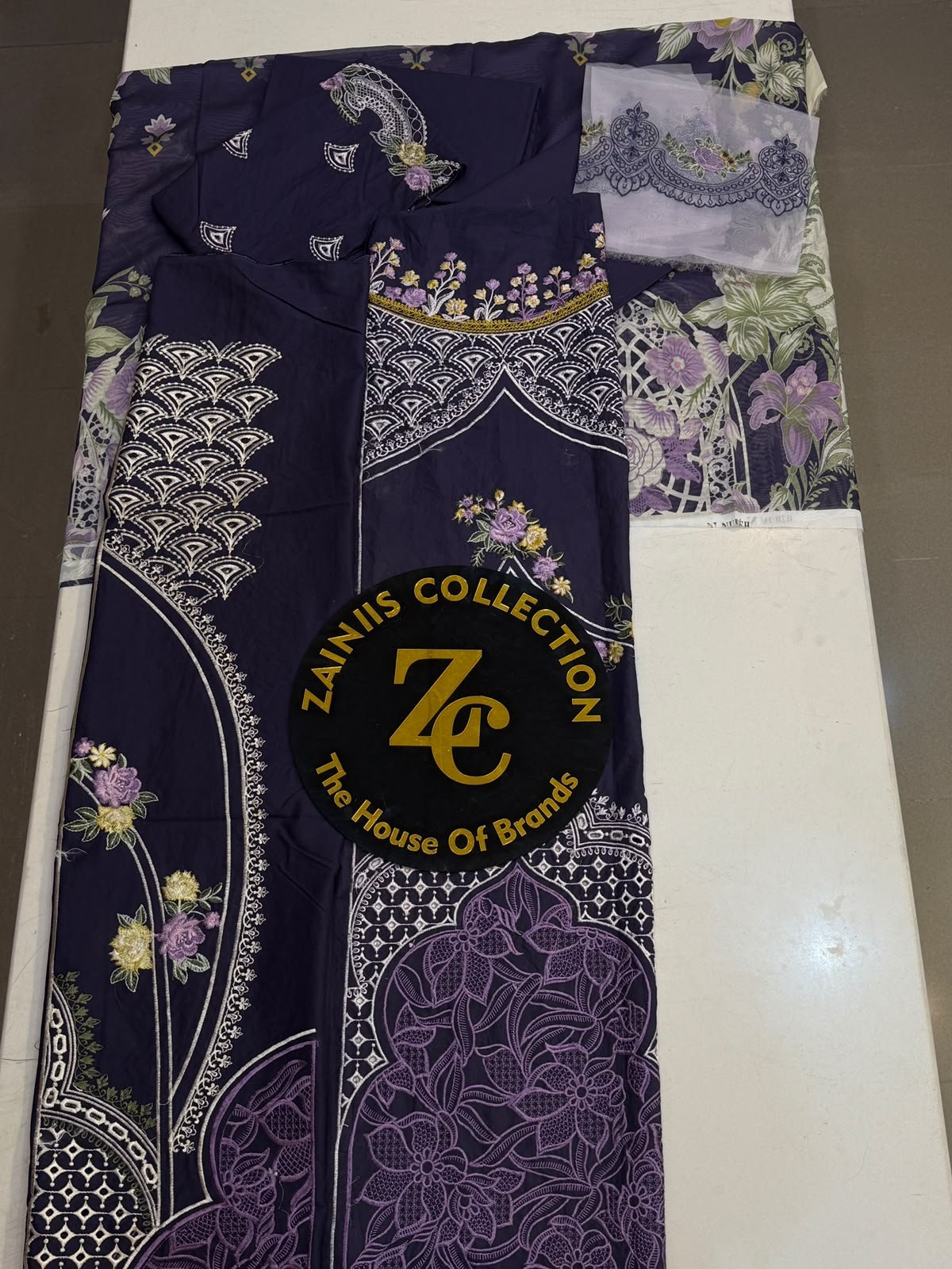 WhatsApp Image 2026-10-06 at 4.24.26 PM (1) Nureh Deep Purple Embroidered Lawn 3-Piece Suit with Floral Printed Chiffon Dupatta - Image 1