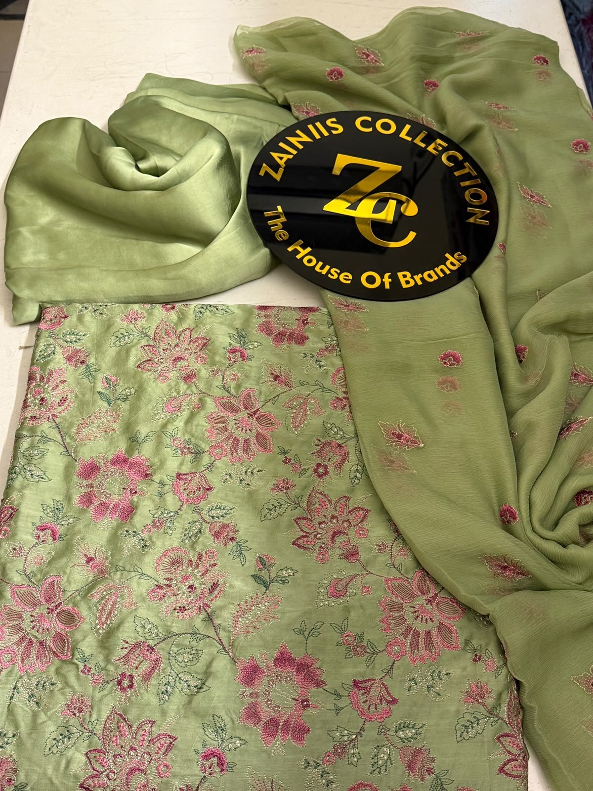 WhatsApp Image 2026-10-06 at 5.24.49 PM (1) Bareeza Olive Green Embroidered Silk Wedding Suit with Embroidered Pure Chiffon Dupatta - Image 1