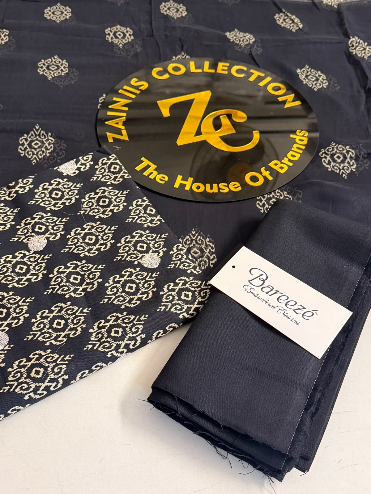 WhatsApp Image 2026-10-09 at 3.49.07 PM Bareeze Black & Gold Printed 3-Piece Unstitched Suit with Matching Trouser - Image 1