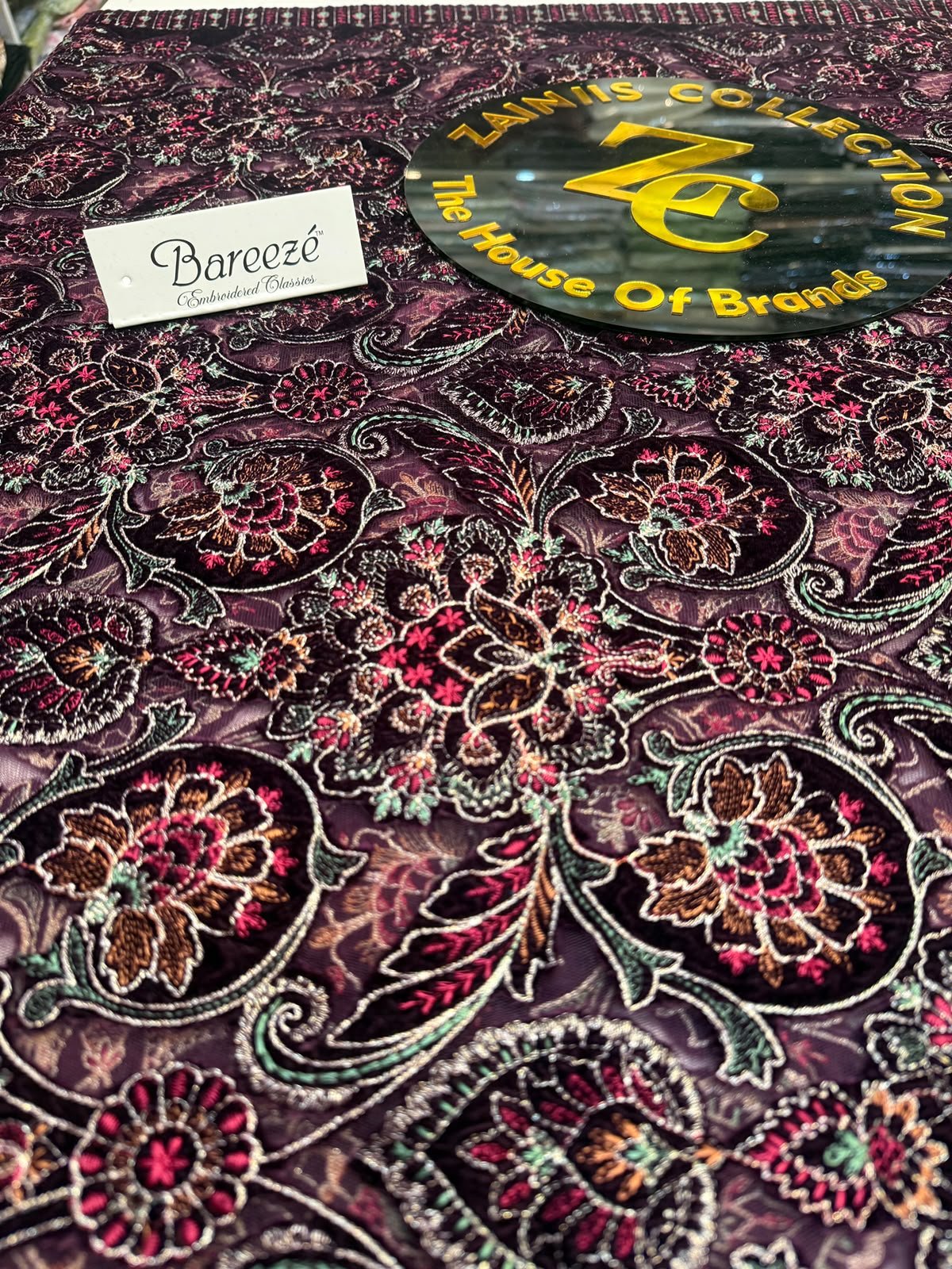 WhatsApp Image 2026-10-10 at 2.16.20 PM (2) Bareeza Dark Plum Velvet Shawl with Multicolor Floral Embroidery and Decorative Border - Image 1