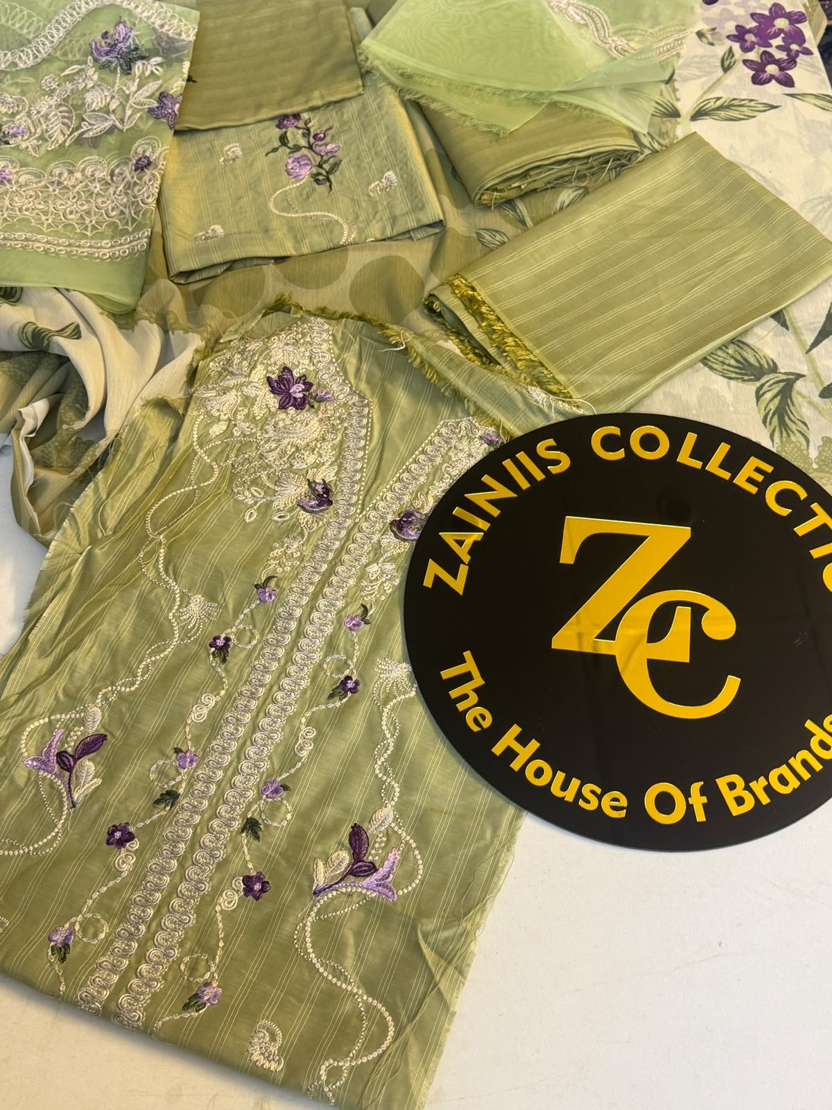 WhatsApp Image 2026-10-13 at 4.06.38 PM (1) Nureh Olive Green Embroidered Viscose Suit with Floral Detailing - Image 1