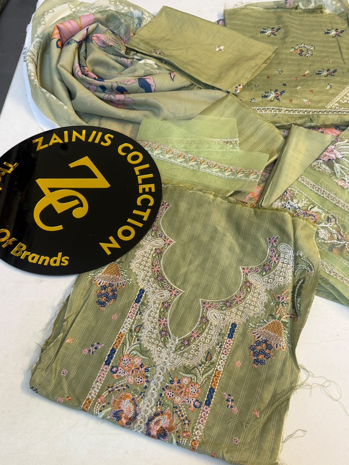 WhatsApp Image 2026-10-13 at 4.06.40 PM Nureh Olive Green Embroidered Viscose Suit with Floral Neckline - Image 1