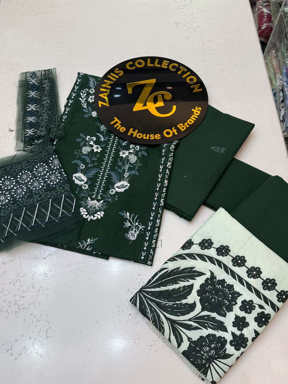 WhatsApp Image 2026-10-15 at 2.20.10 PM (1) Ethnic Dark Green Embroidered Khaddar 3-Piece Suit - Image 1