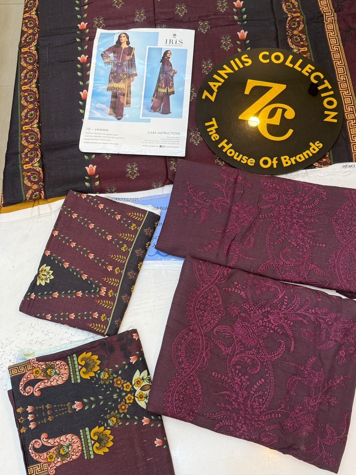 WhatsApp Image 2026-10-16 at 3.27.11 PM (2) IRIS Janan 3-Piece Embroidered Khaddar Suit – Maroon & Black - Image 1