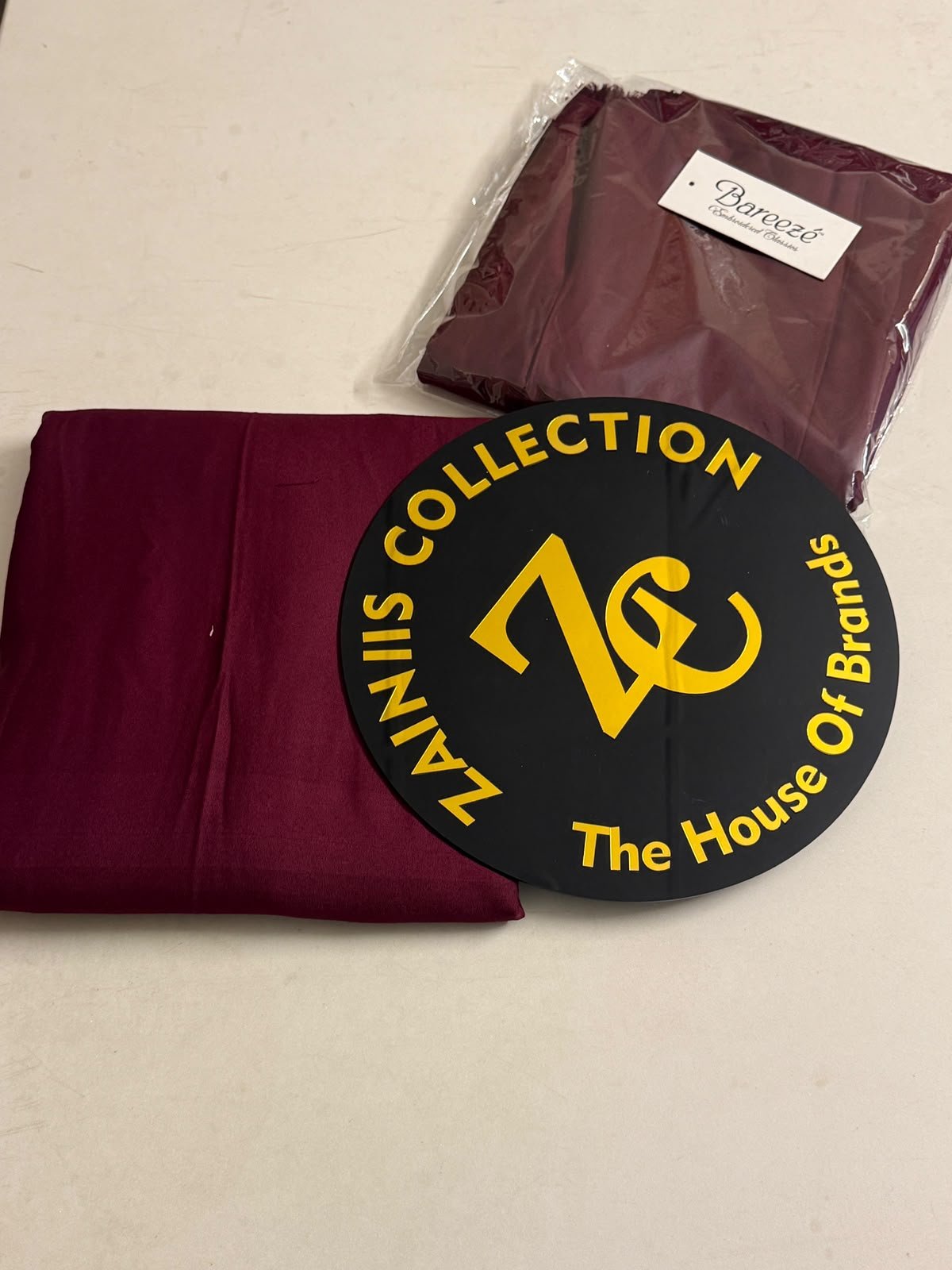 WhatsApp Image 2026-10-16 at 4.56.16 PM (1) Bareeza Plain Karandi Fabric – Burgundy - Image 1