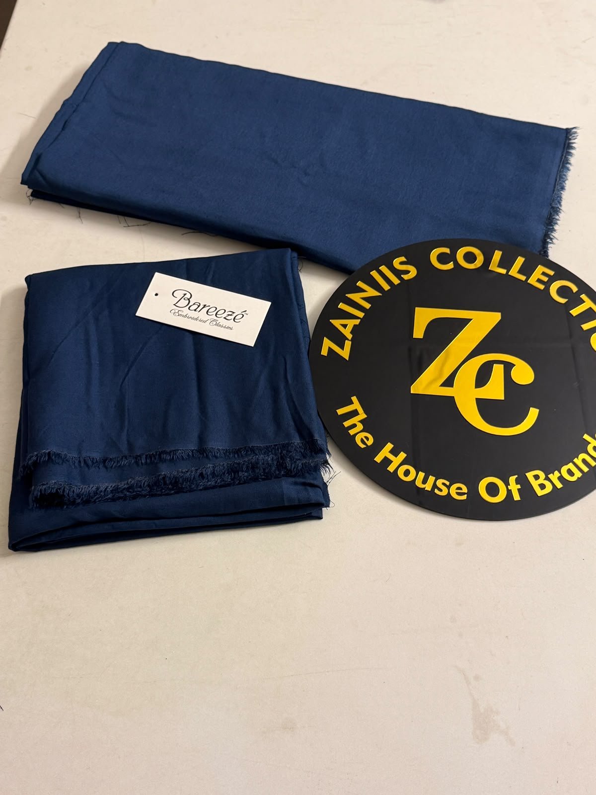 WhatsApp Image 2026-10-16 at 4.56.17 PM (2) Bareeza Plain Karandi Fabric – Navy Blue - Image 1