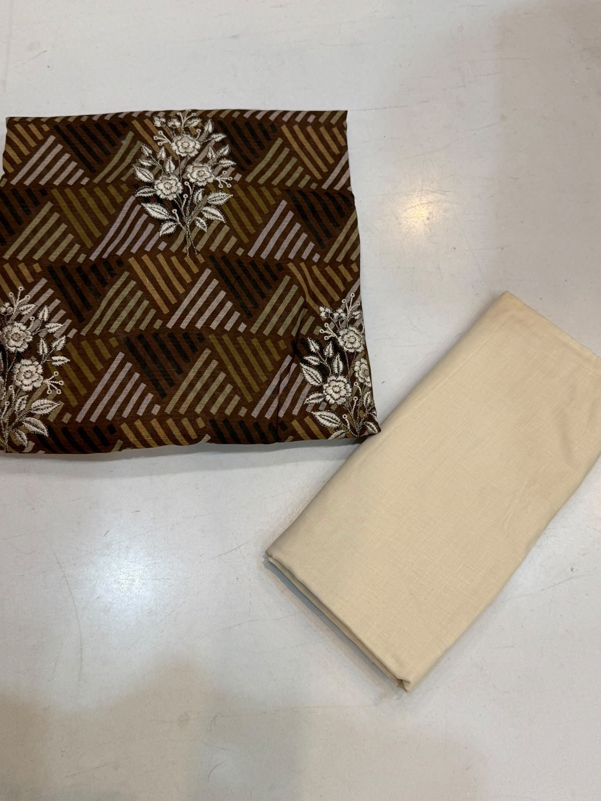 WhatsApp Image 2026-10-17 at 2.52.30 PM (1) Bareeza Summer Lawn 3-Piece Suit – Elegant Brown & Beige - Image 1