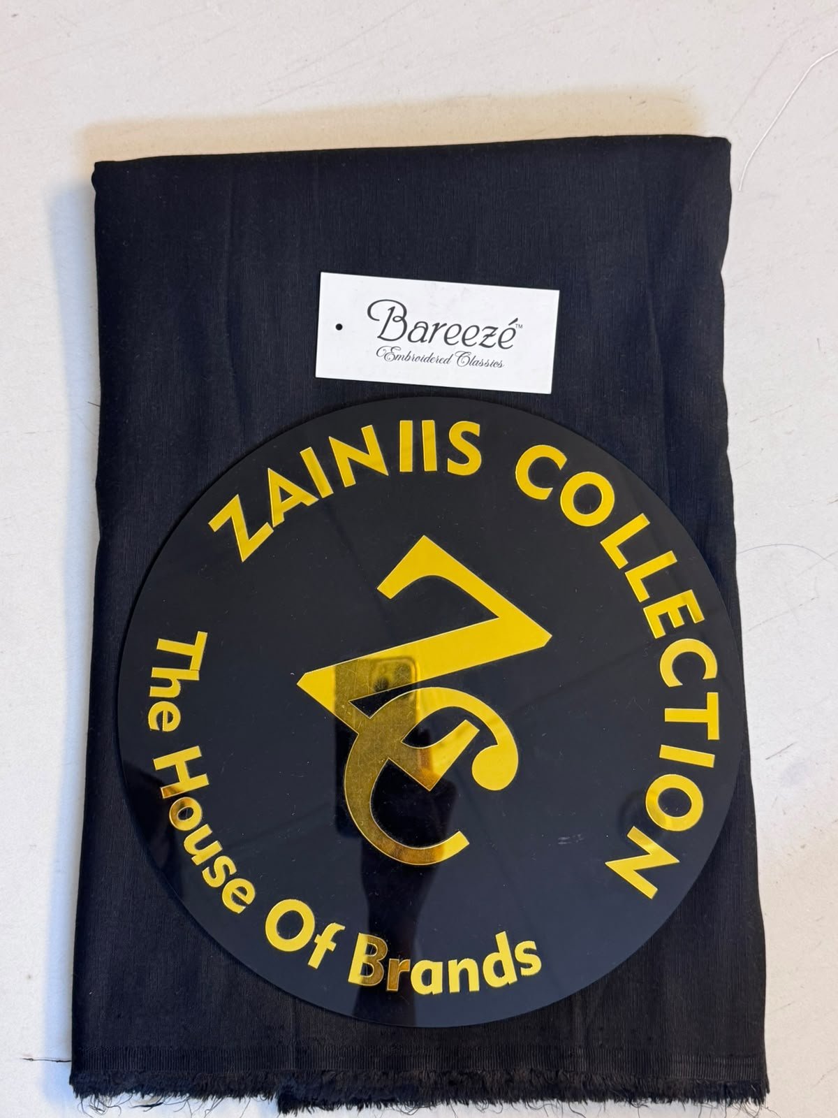 WhatsApp Image 2026-10-19 at 1.34.50 PM (1) Bareeze Black Karandi Unstitched Suit - Image 1
