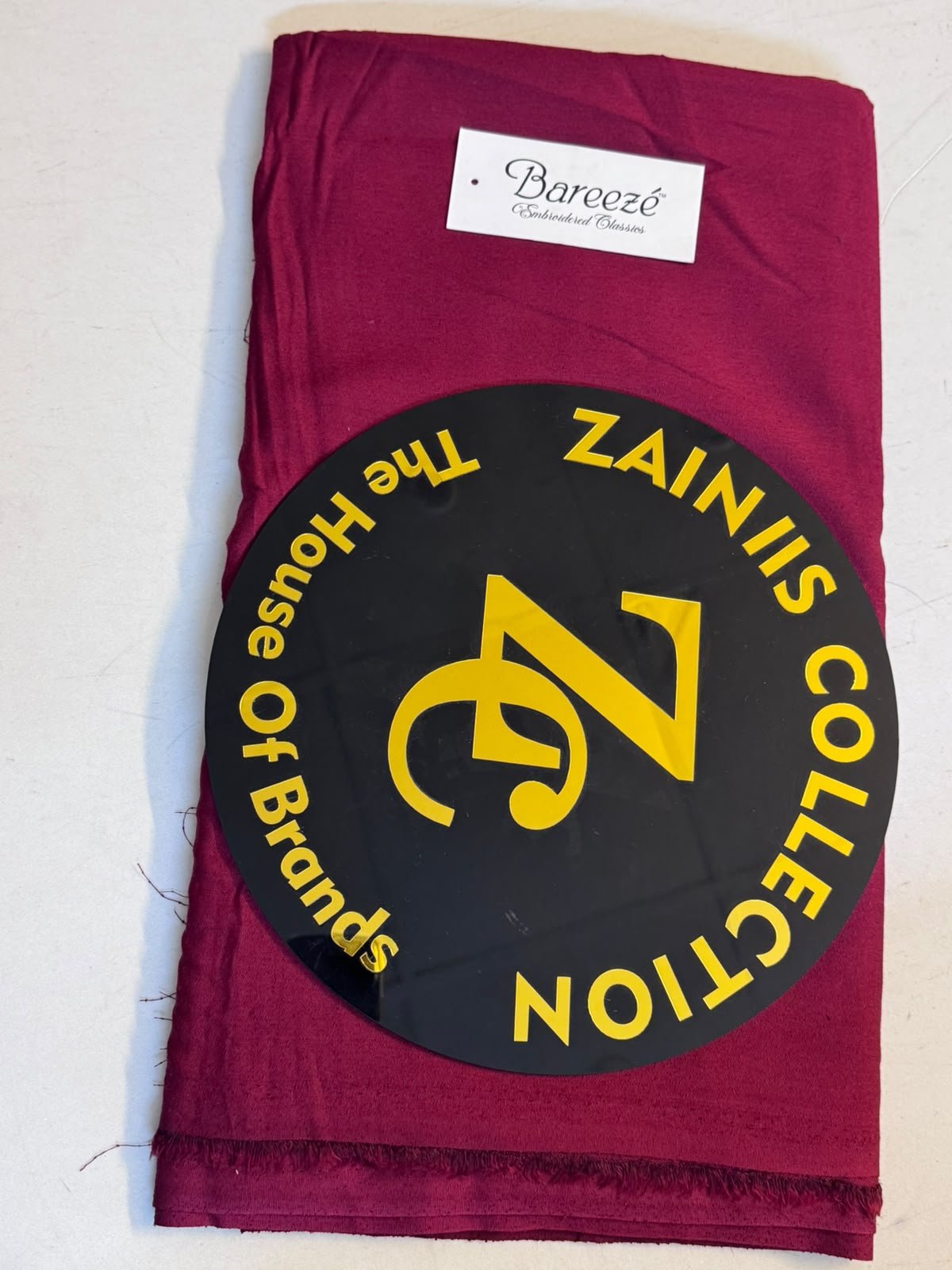 WhatsApp Image 2026-10-19 at 1.34.54 PM Bareeze Maroon Karandi Unstitched Suit - Image 1